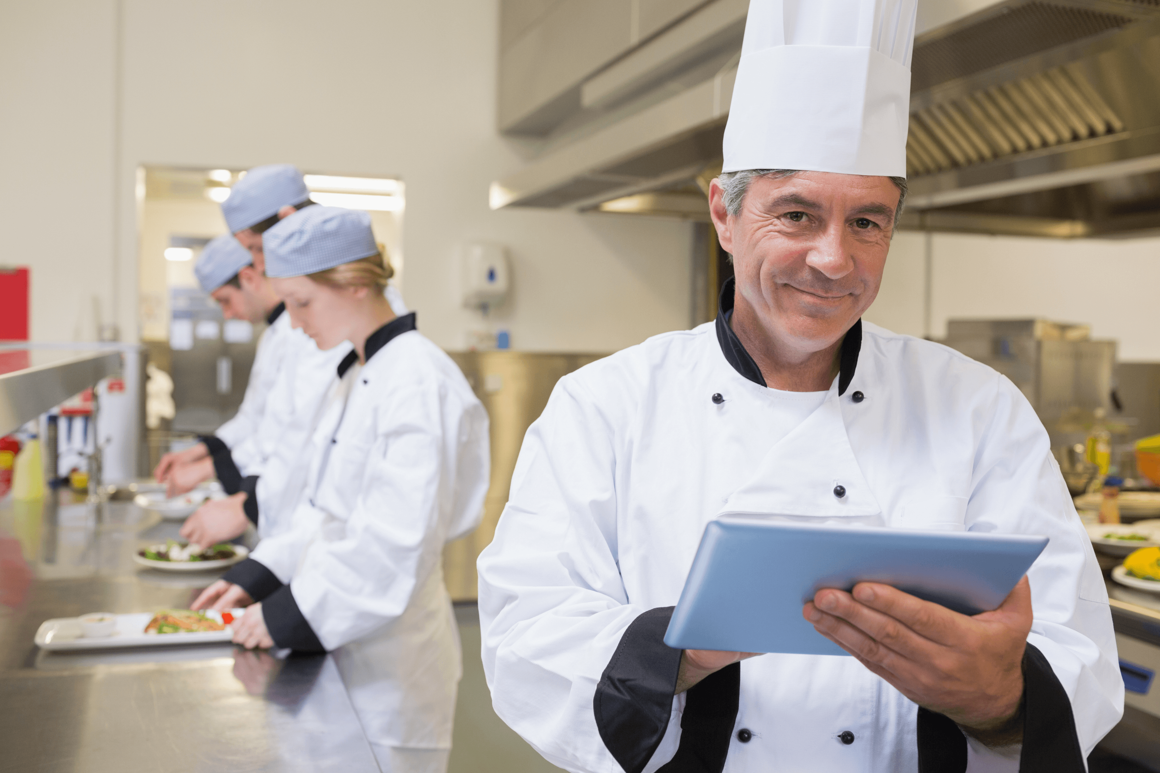 Chef receiving orders directly on a tablet in the kitchen